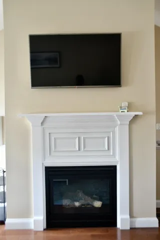 a kitchen with a sink stainless steel appliances and cabinets