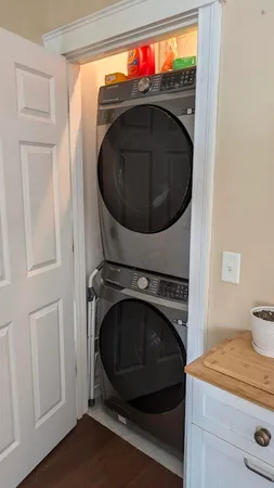 a bathroom with a toilet a sink and a mirror