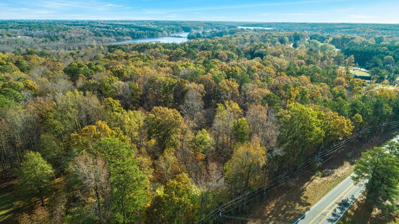 0 Penny Road Raleigh, NC 27606 - Photo 26 of 26 a view of a city with lush green forest
