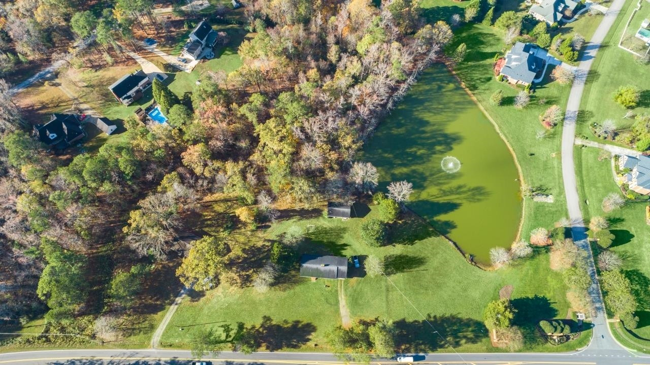 0 Penny Road Raleigh, NC 27606 - Photo 10 of 26 an aerial view of a residential houses with yard