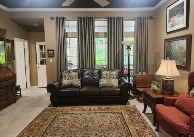 a living room with furniture and a window