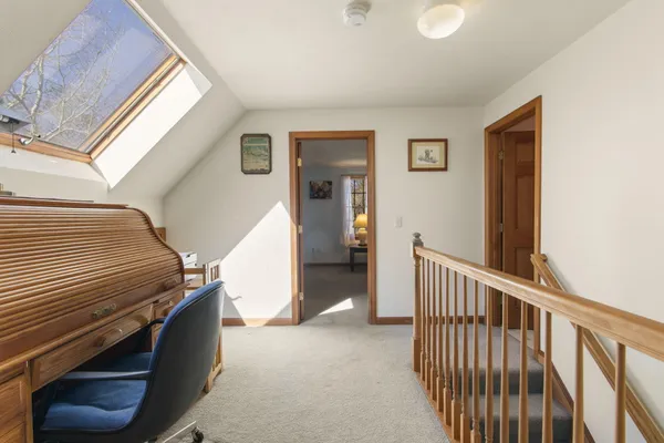 a view of a hallway with entryway