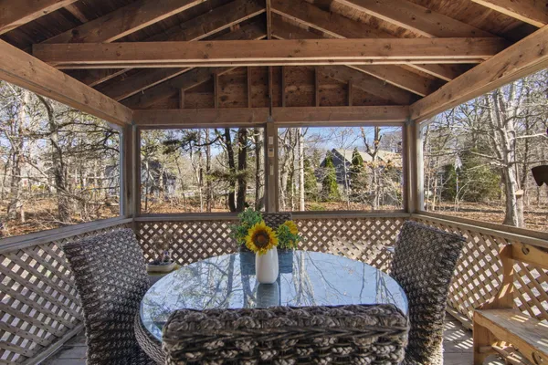 a view of sitting area in front of a house