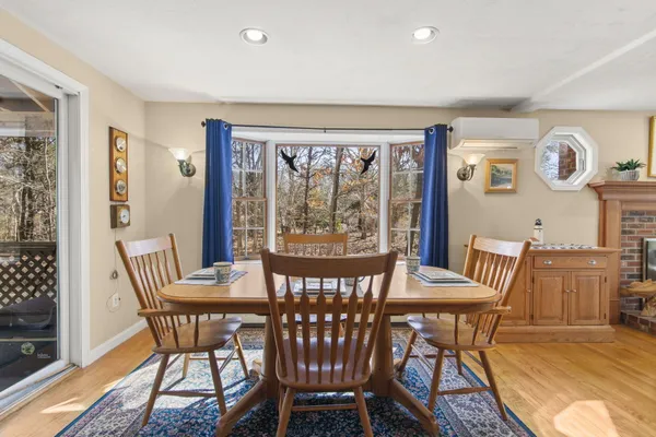 a view of a dining room with furniture window and outside view