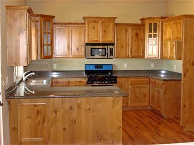 900 Win Way Eagle Point, OR 97524 - Photo 4 of 9 a kitchen with stainless steel appliances granite countertop a stove a sink and a microwave