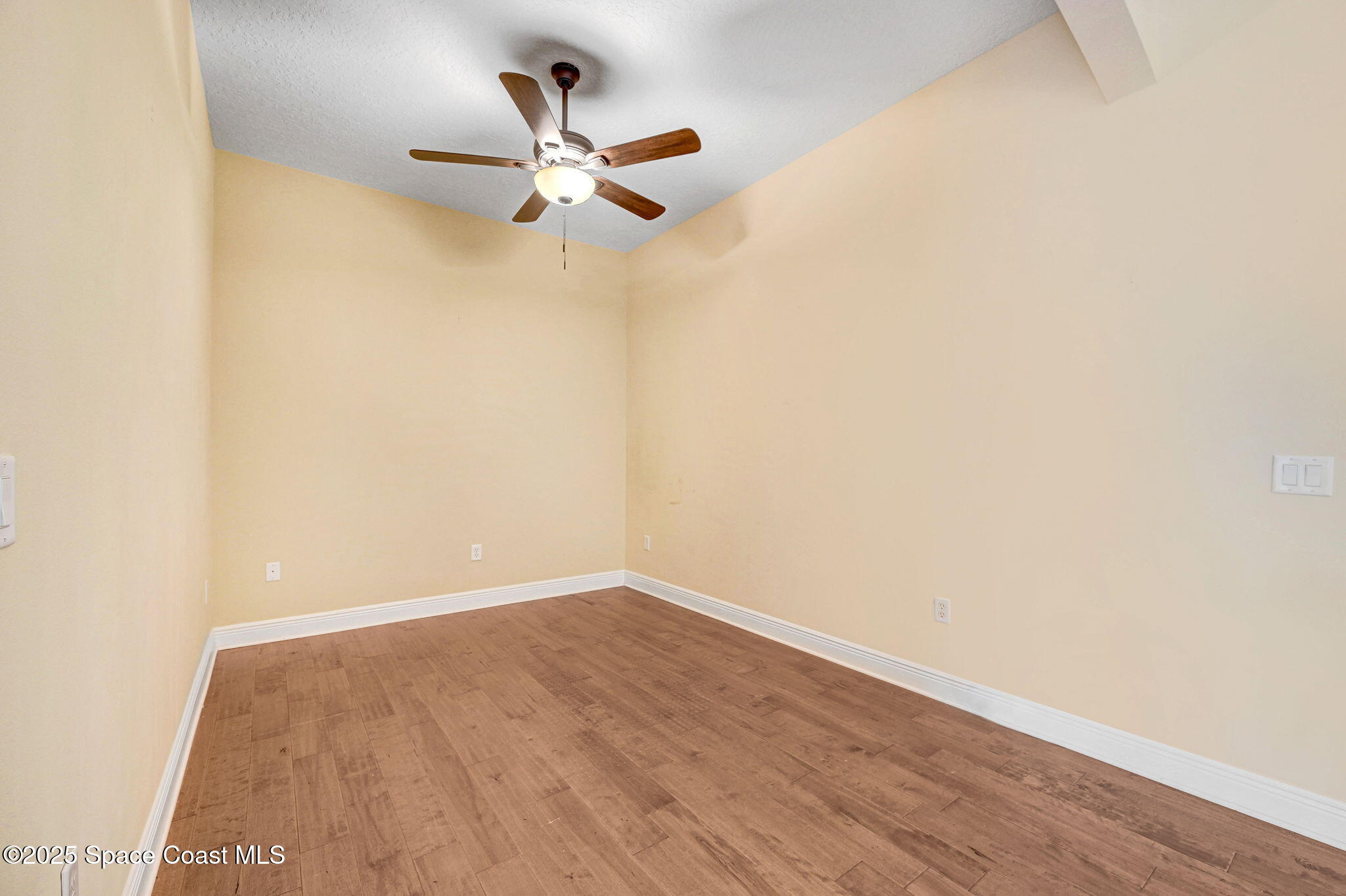 2178 Tanager Court Indialantic, FL 32903 - Photo 22 of 30 wooden floor in a empty room