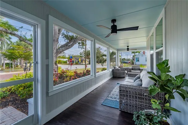 a living room with furniture rug and window