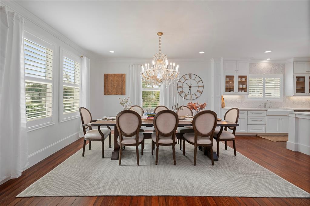 359 Gill Street Punta Gorda, FL 33950 - Photo 21 of 83 a view of a dining room with furniture window and wooden floor
