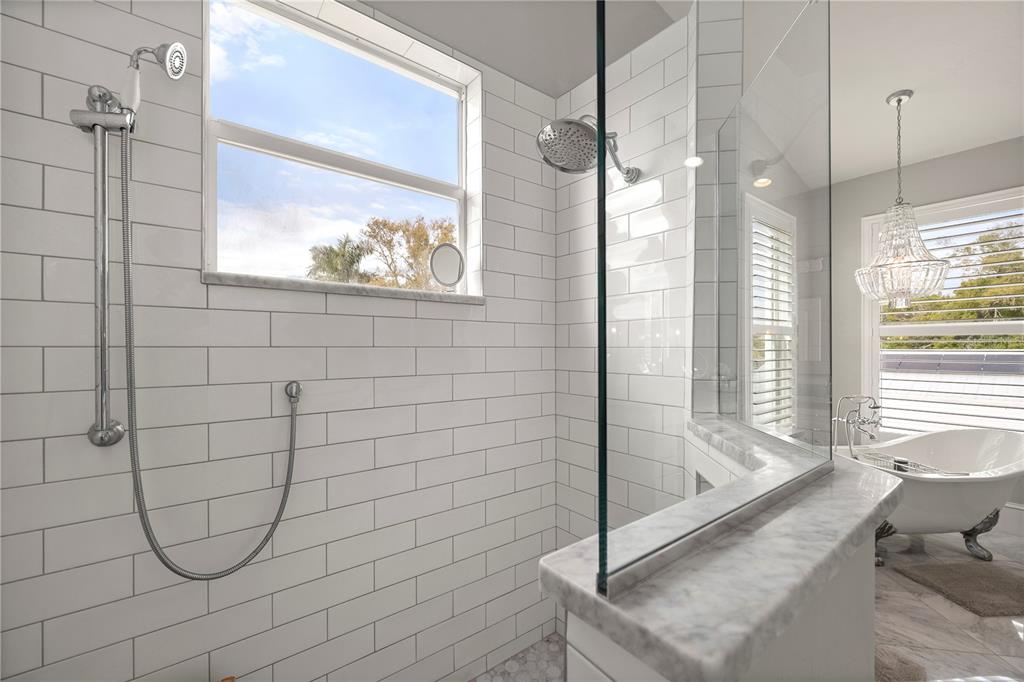 359 Gill Street Punta Gorda, FL 33950 - Photo 46 of 83 a bathroom with a bathtub and shower