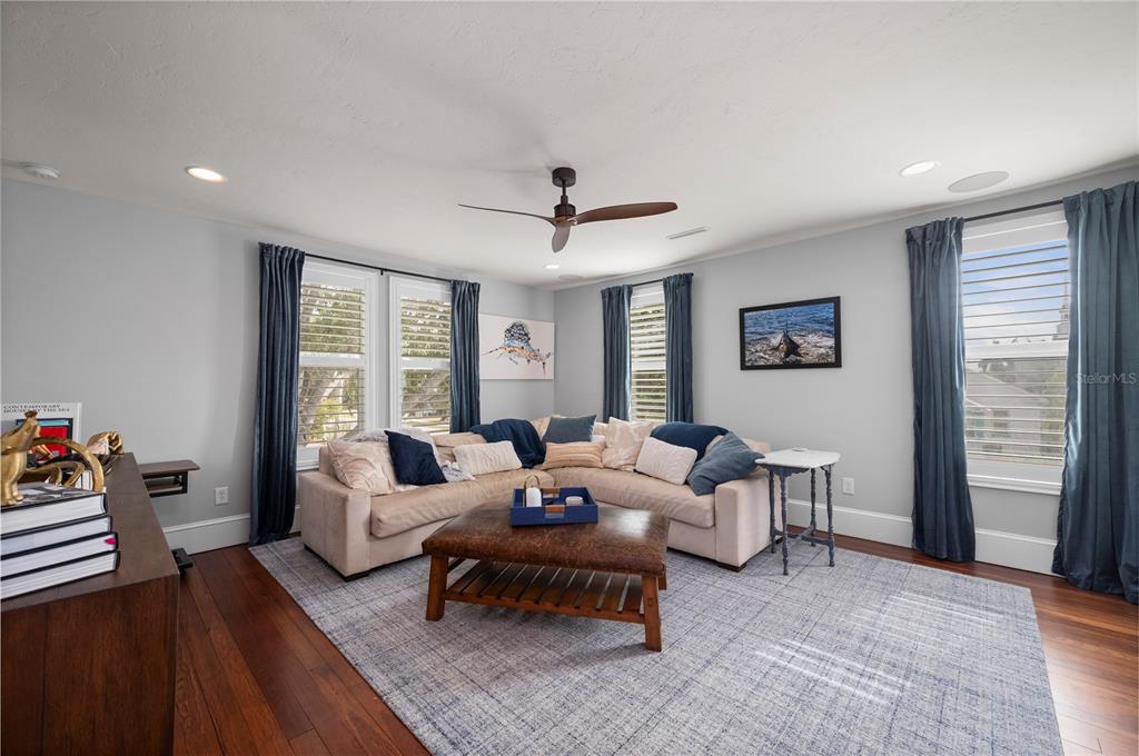 359 Gill Street Punta Gorda, FL 33950 - Photo 59 of 83 a living room with furniture and wooden floor
