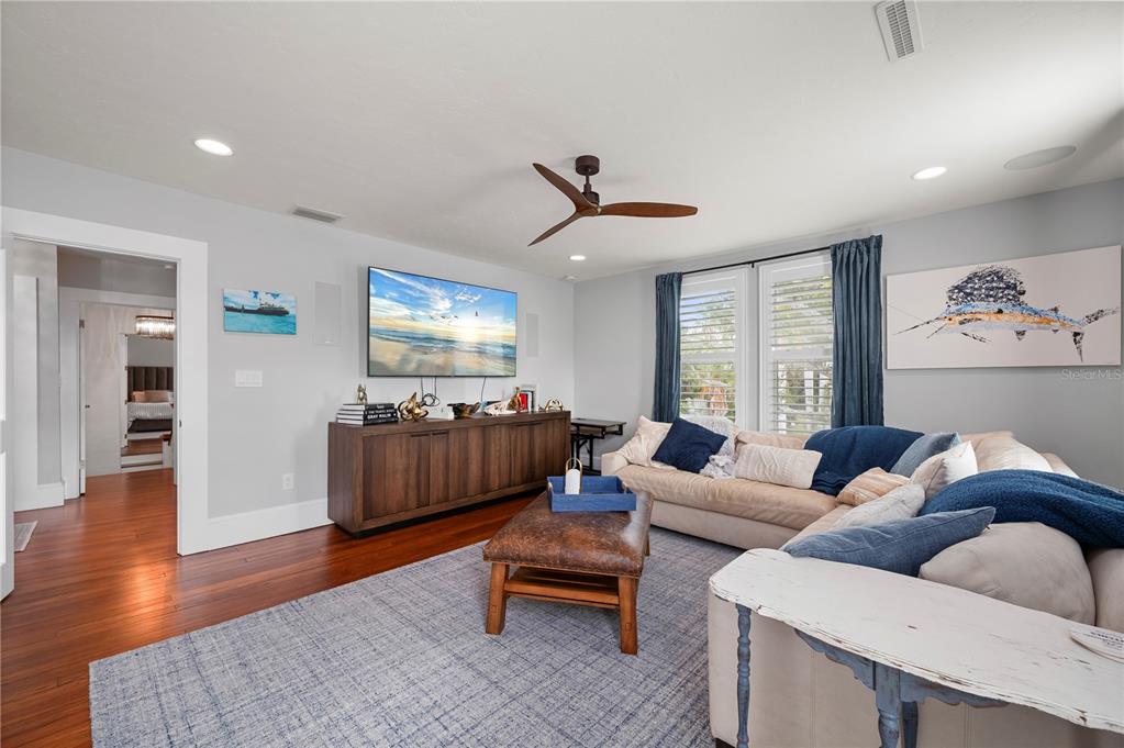 359 Gill Street Punta Gorda, FL 33950 - Photo 60 of 83 a living room with furniture and wooden floor