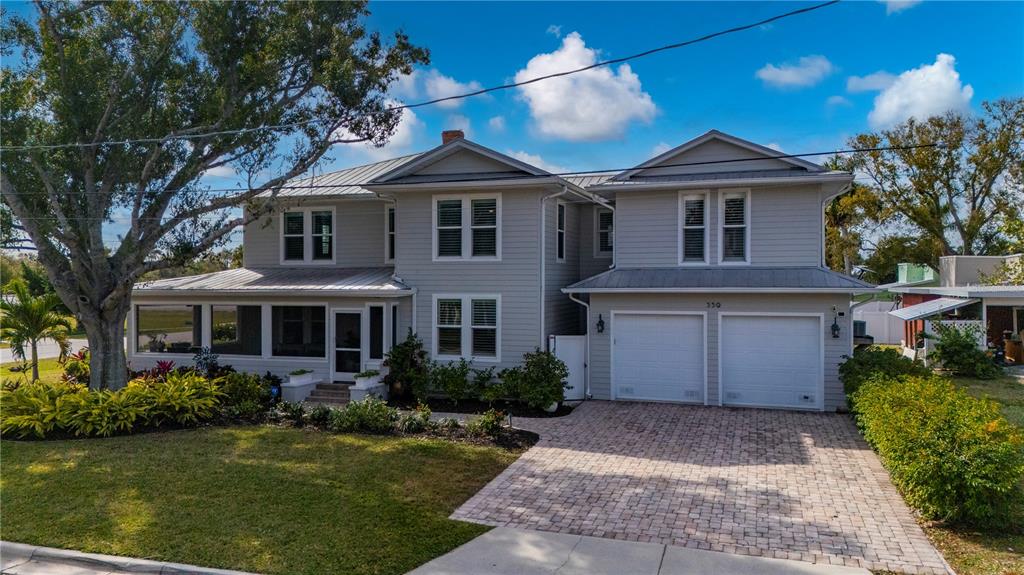 359 Gill Street Punta Gorda, FL 33950 - Photo 66 of 83 a front view of a house with a yard