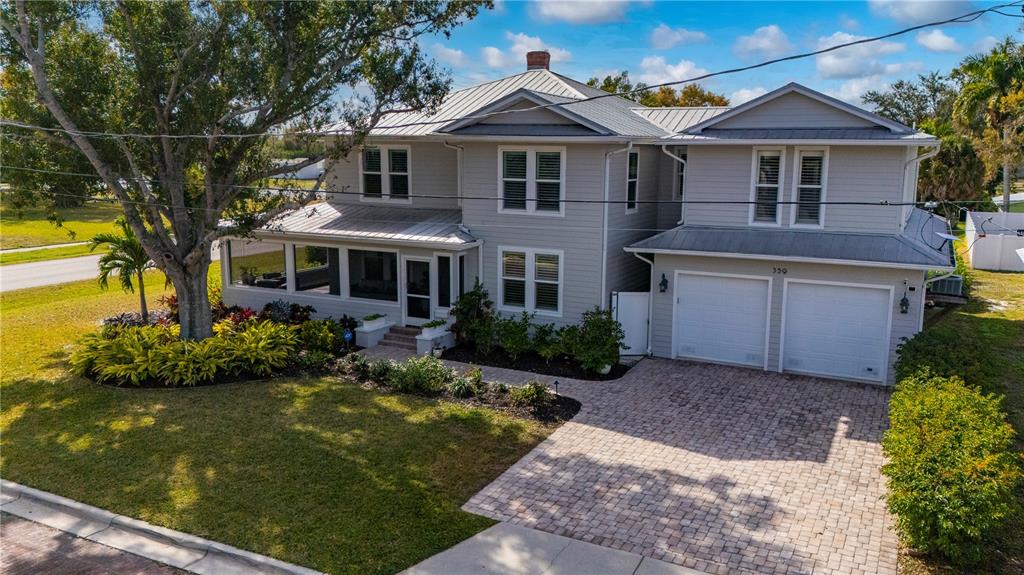 359 Gill Street Punta Gorda, FL 33950 - Photo 8 of 83 a front view of a house with a yard