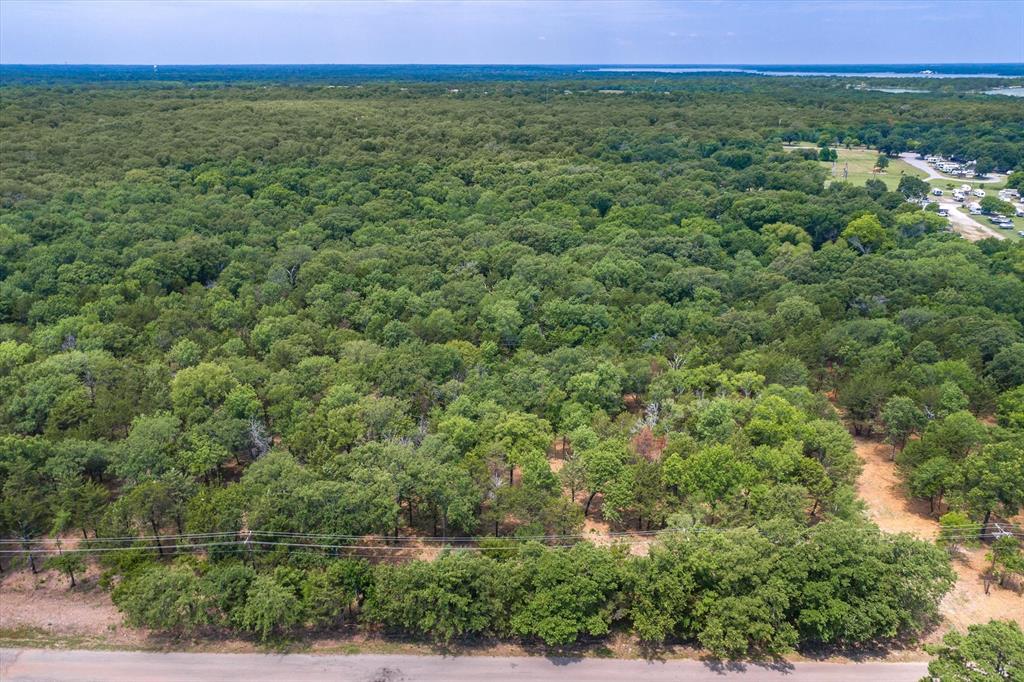 4407 County Road 3706 Wills Point, TX 75169 - Photo 9 of 11 a view of a lush green field