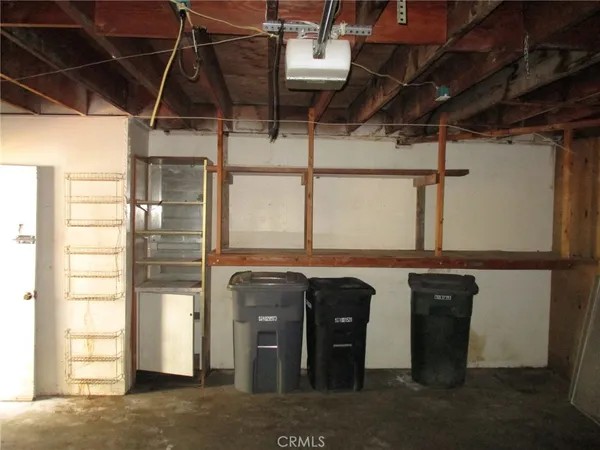 a kitchen with a refrigerator and window