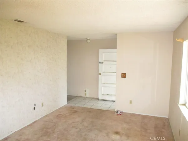 an empty room with closet