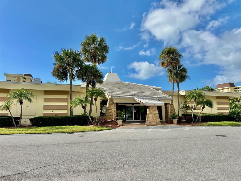 4550 Cove Circle, Unit 905 St. Petersburg, FL 33708 - Photo 12 of 17 a view of a car parked in front of a building