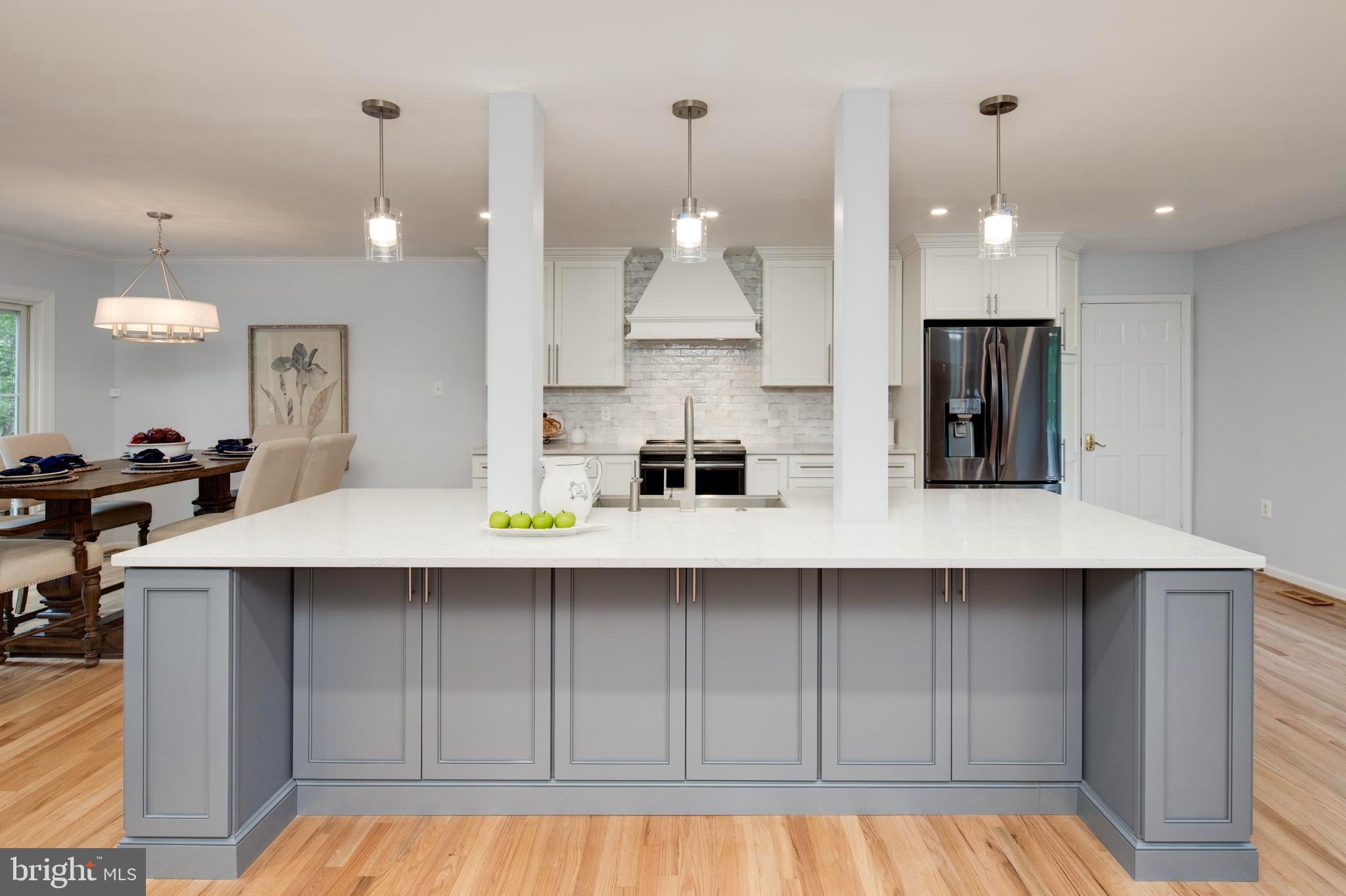 11005 Birdfoot Court Reston, VA 20191 - Photo 2 of 28 Renovated designer kitchen with massive island.