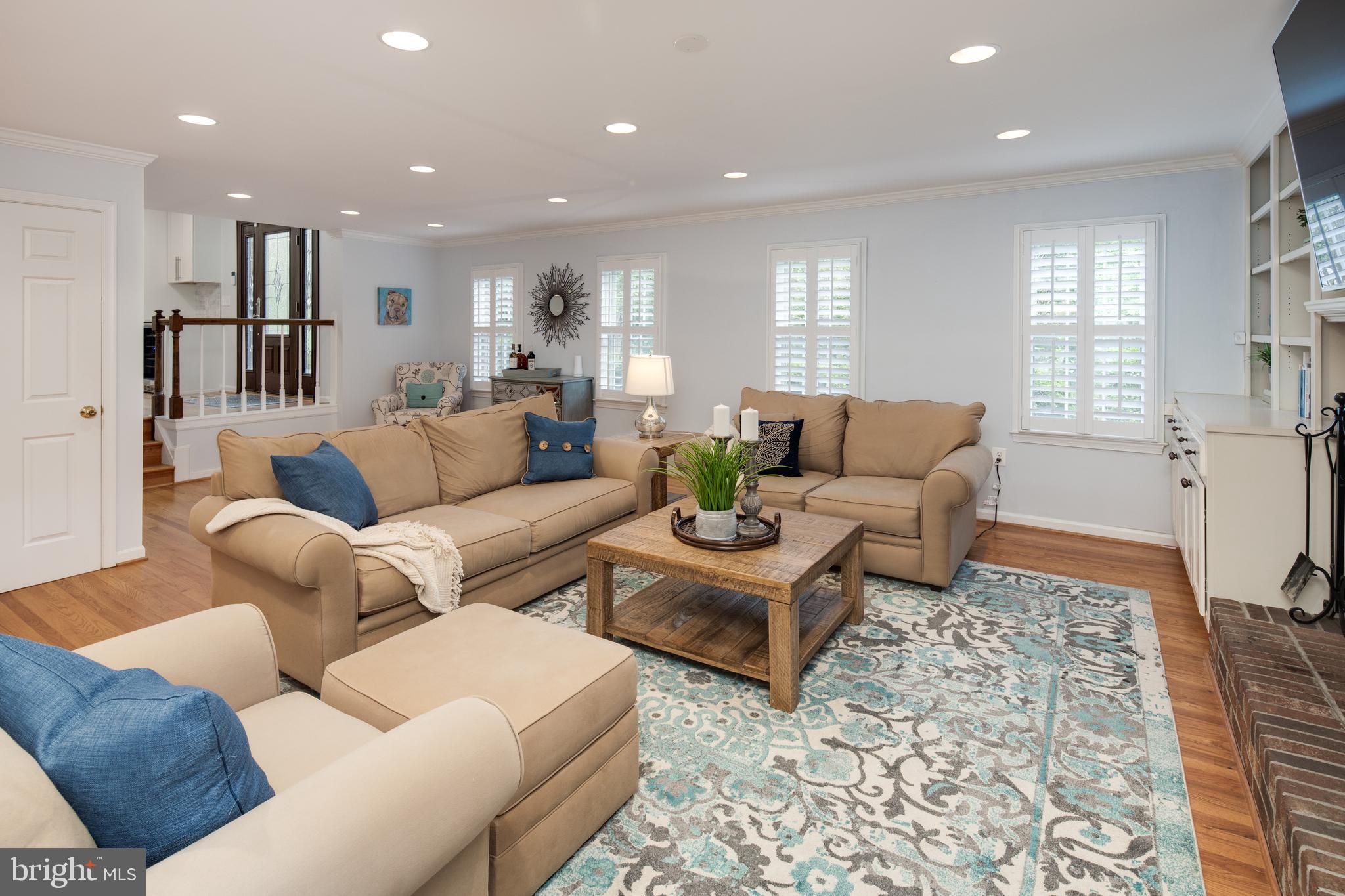 11005 Birdfoot Court Reston, VA 20191 - Photo 19 of 28 Cozy & bright family room with plantation shutters