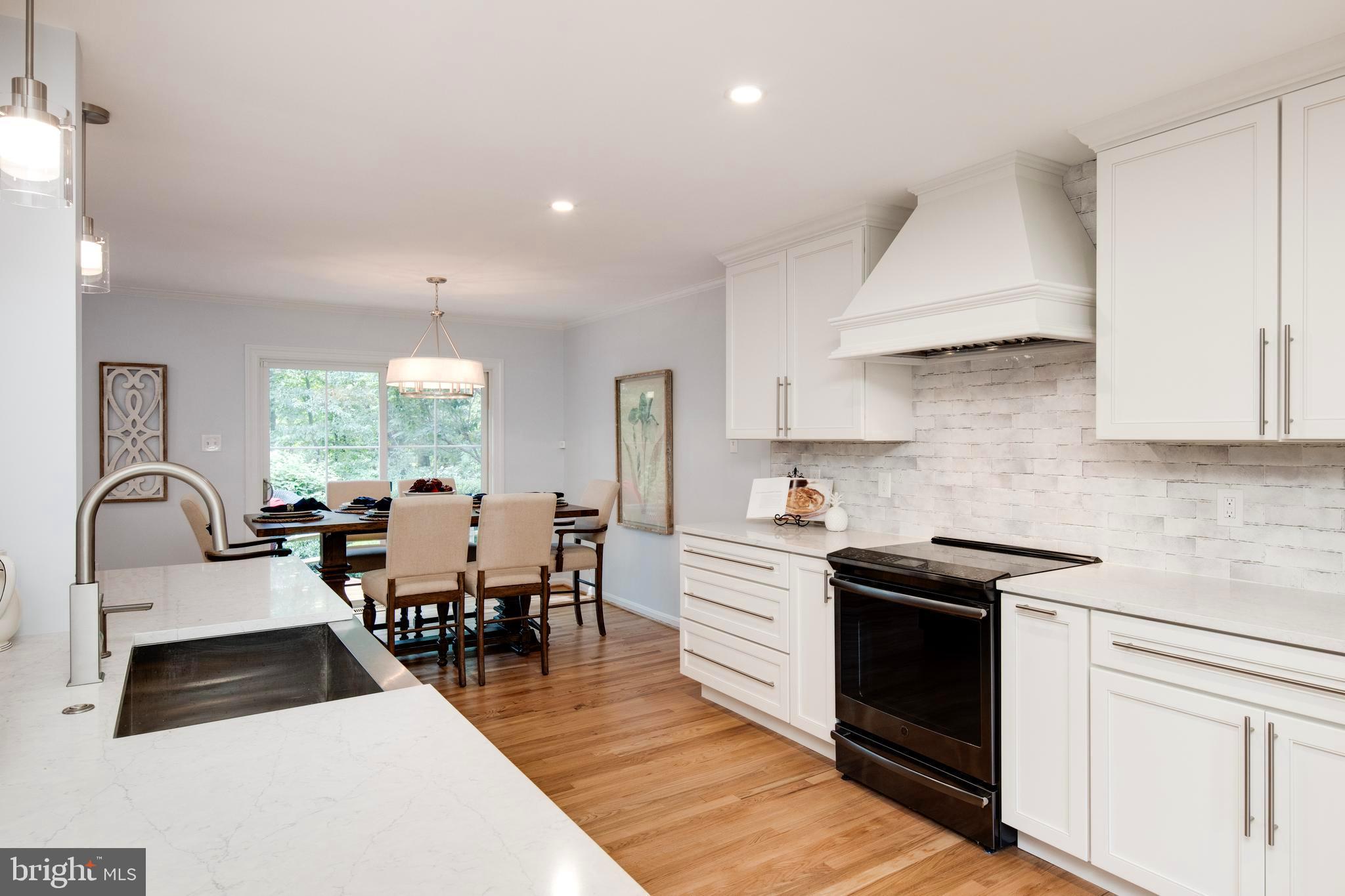 11005 Birdfoot Court Reston, VA 20191 - Photo 3 of 28 Details and decorator touches, quartz counters.