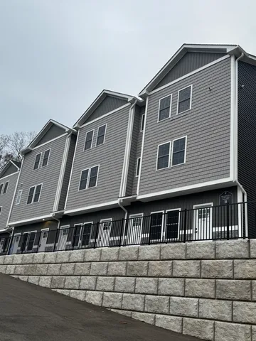 a front view of a house with windows