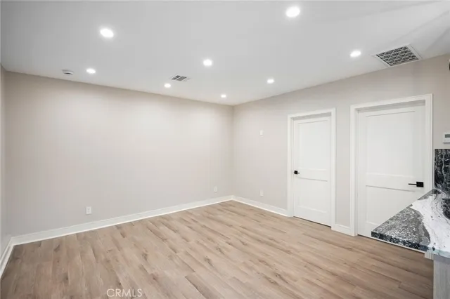 a view of livingroom with wooden floor