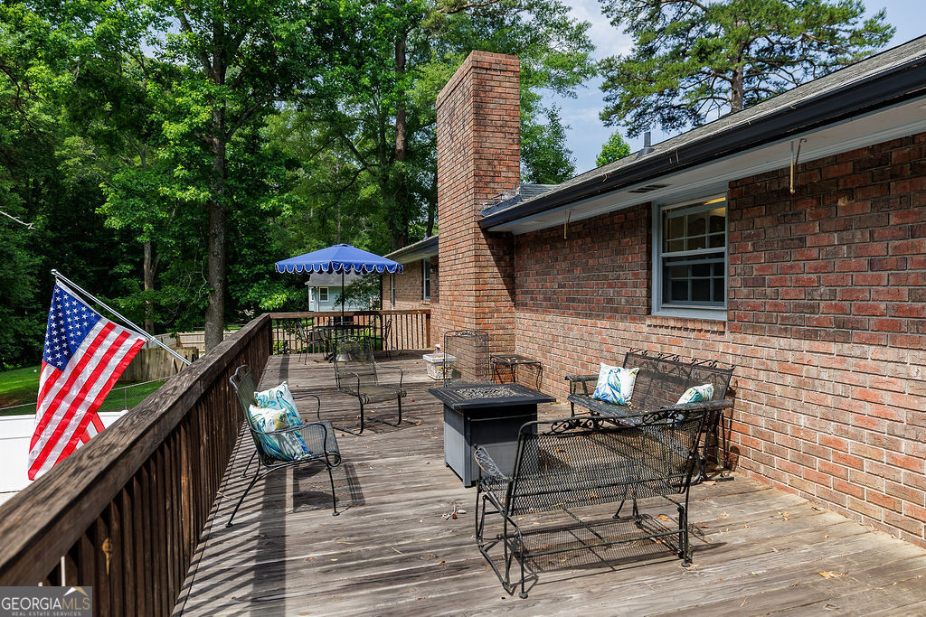 226 Baker Street Statham, GA 30666 - Photo 52 of 55 a view of backyard with furniture and outdoor seating