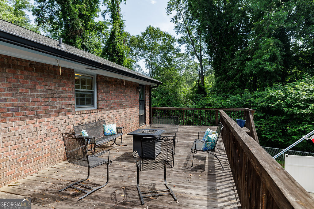 226 Baker Street Statham, GA 30666 - Photo 54 of 55 a roof deck view with table and chairs
