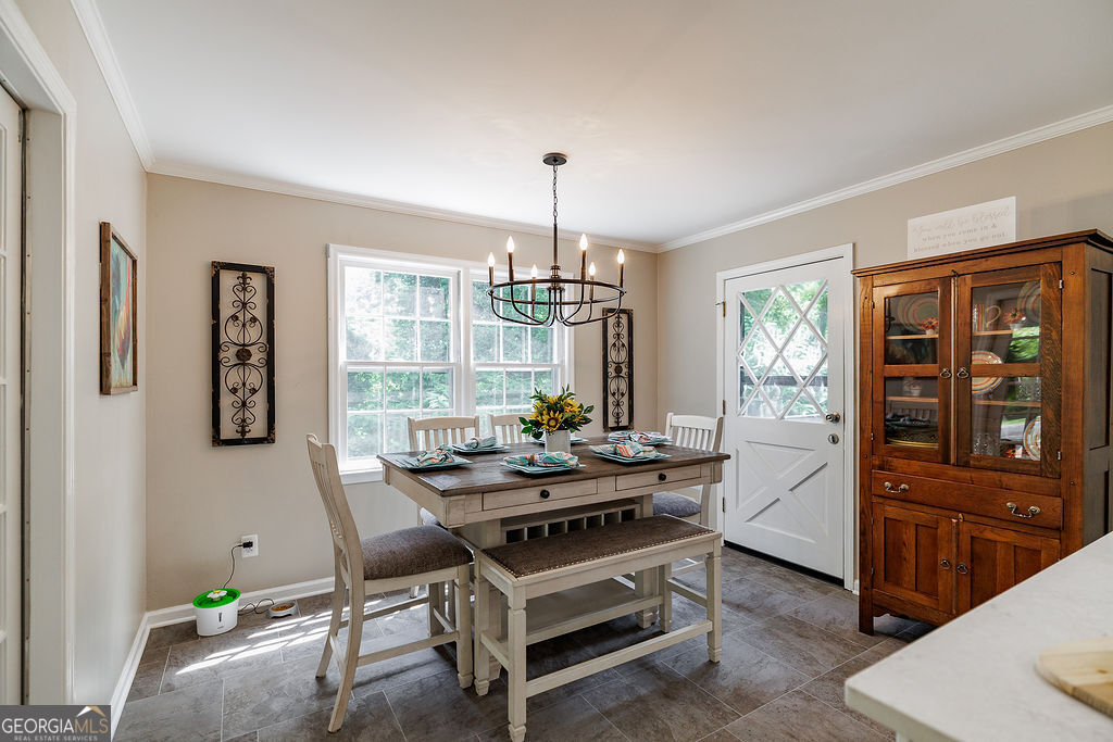 226 Baker Street Statham, GA 30666 - Photo 9 of 55 a dining room with furniture and window