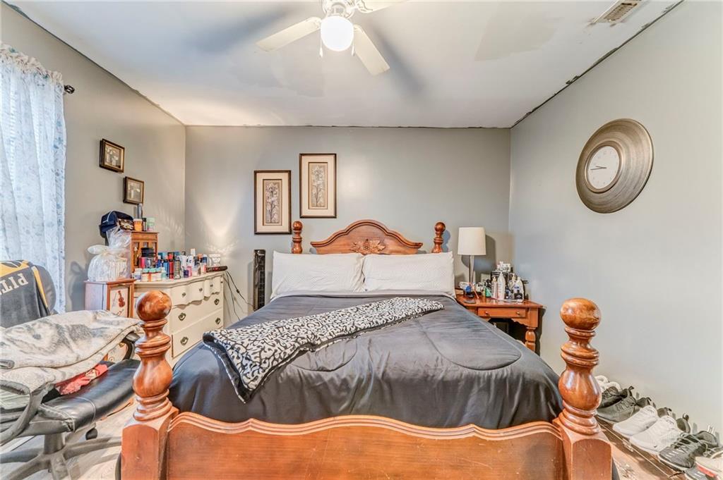 213 Iron Street Northwest Rome, GA 30165 - Photo 21 of 28 a bedroom with a bed and window