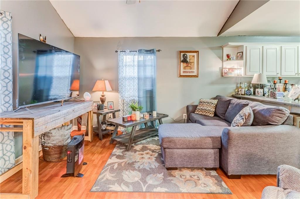 213 Iron Street Northwest Rome, GA 30165 - Photo 10 of 28 a living room with furniture and wooden floor
