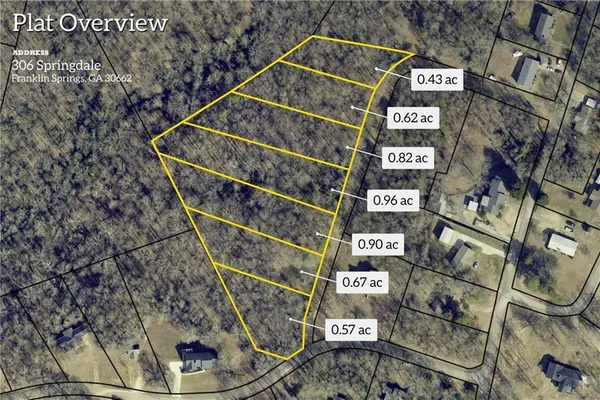 a street sign on a pole on a street