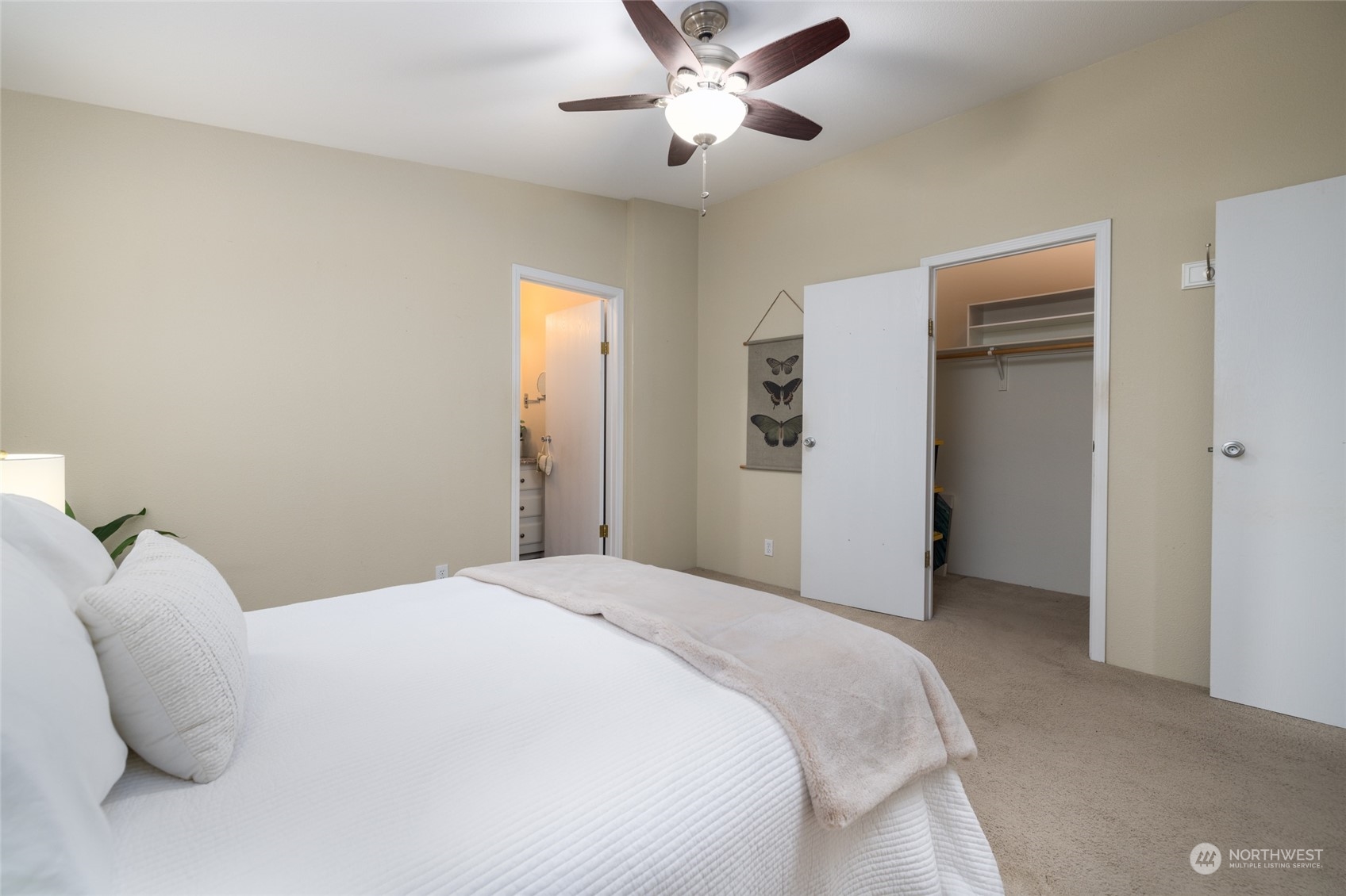 16419 Dike Road Mount Vernon, WA 98273 - Photo 23 of 39 a bedroom with a bed and a ceiling fan