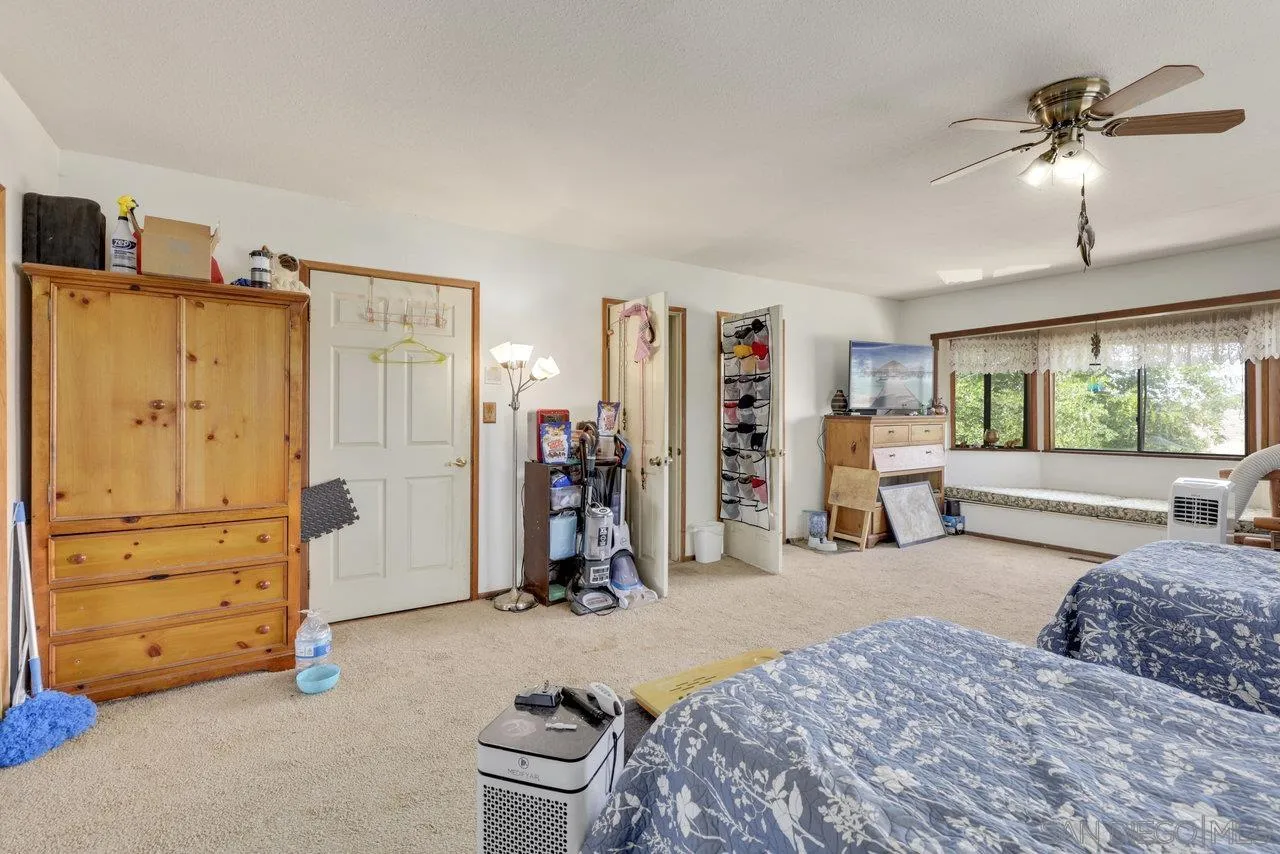 2212 Sonora Way Ramona, CA 92065 - Photo 11 of 29 a bedroom with furniture and a large window