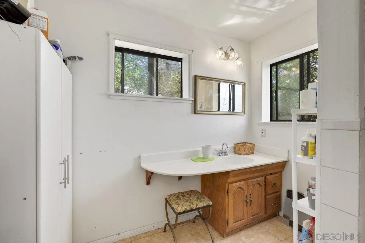 2212 Sonora Way Ramona, CA 92065 - Photo 13 of 29 a bathroom with a sink and a window