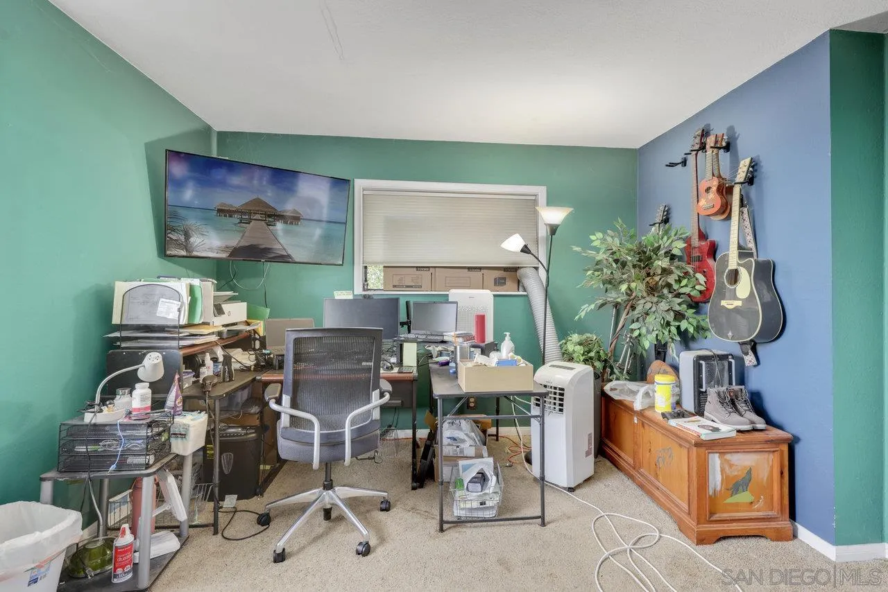 2212 Sonora Way Ramona, CA 92065 - Photo 15 of 29 a work room with furniture and a potted plant