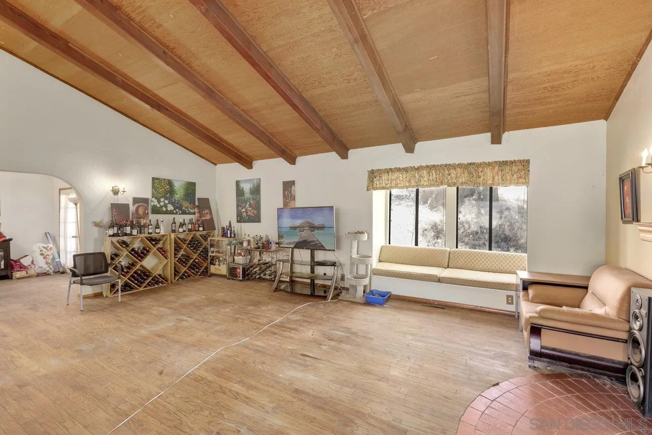 2212 Sonora Way Ramona, CA 92065 - Photo 2 of 29 a living room with lots of furniture and a chandelier