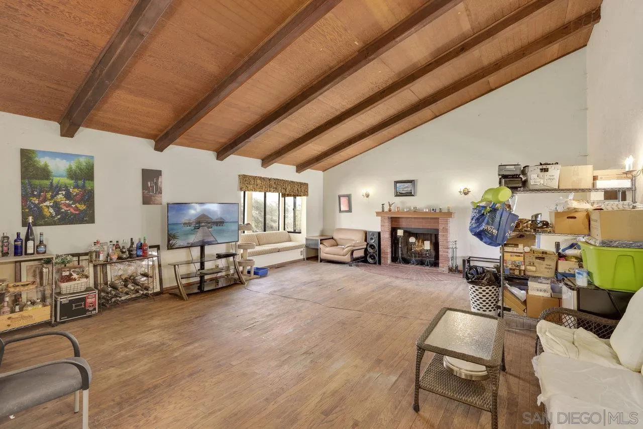 2212 Sonora Way Ramona, CA 92065 - Photo 3 of 29 a living room with furniture and a fireplace