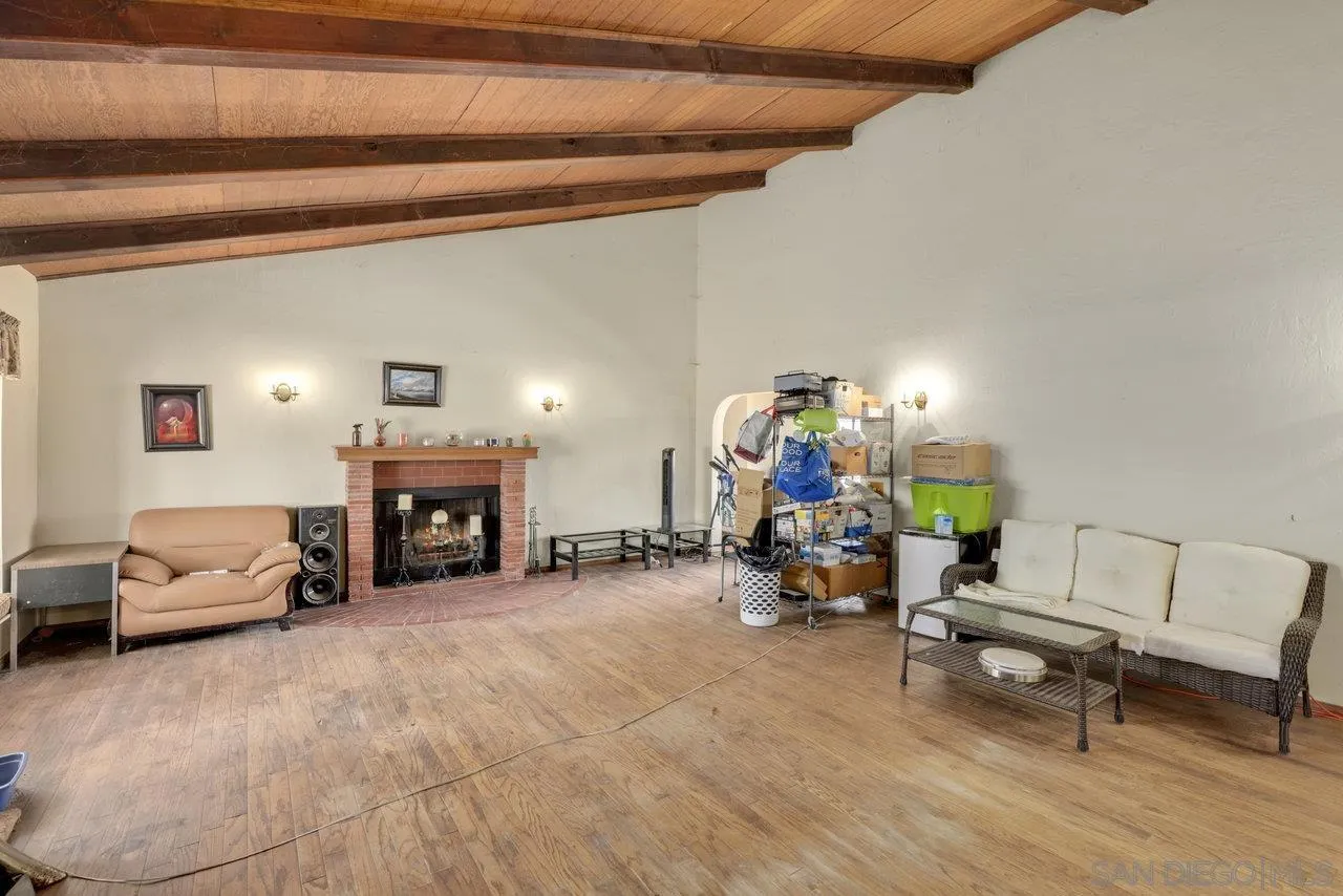 2212 Sonora Way Ramona, CA 92065 - Photo 4 of 29 a living room with furniture and a fireplace