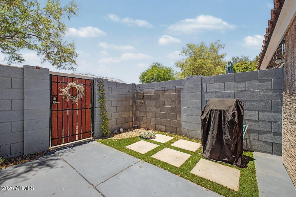 860 North McQueen Road, Unit 1135 Chandler, AZ 85225 - Photo 20 of 24 a view of a backyard