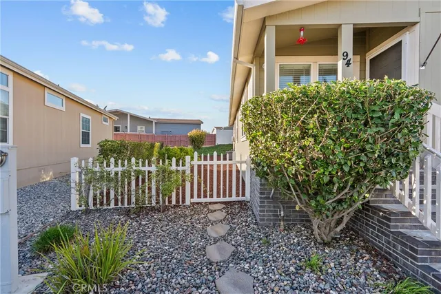 a view of a backyard with plants