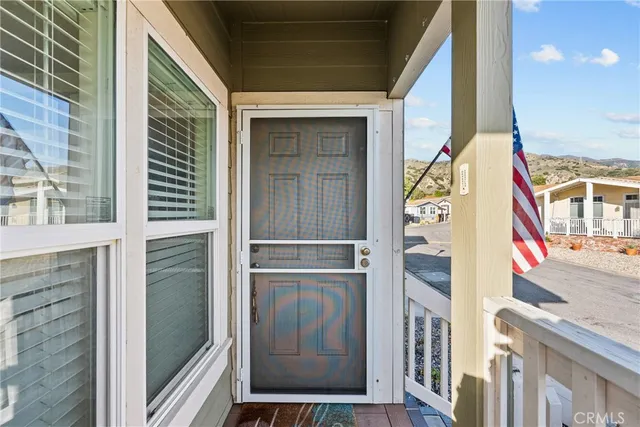 a dining room with furniture and a window