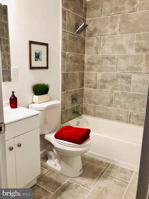 1832 Cedar Road Pasadena, MD 21122 - Photo 33 of 47 FULL BATH WITH CERAMIC TILE