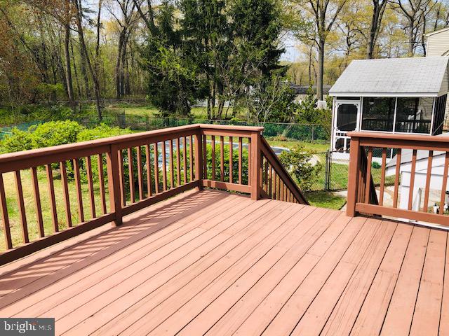 1832 Cedar Road Pasadena, MD 21122 - Photo 9 of 47 LARGE DECK WITH STEPS TO POOL AREA
