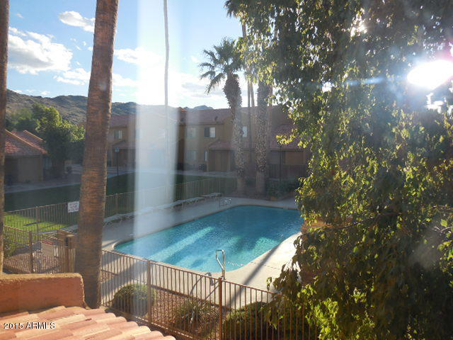 3511 East Baseline Road, Unit 1253 Phoenix, AZ 85042 - Photo 9 of 34 Pool view from bdrm