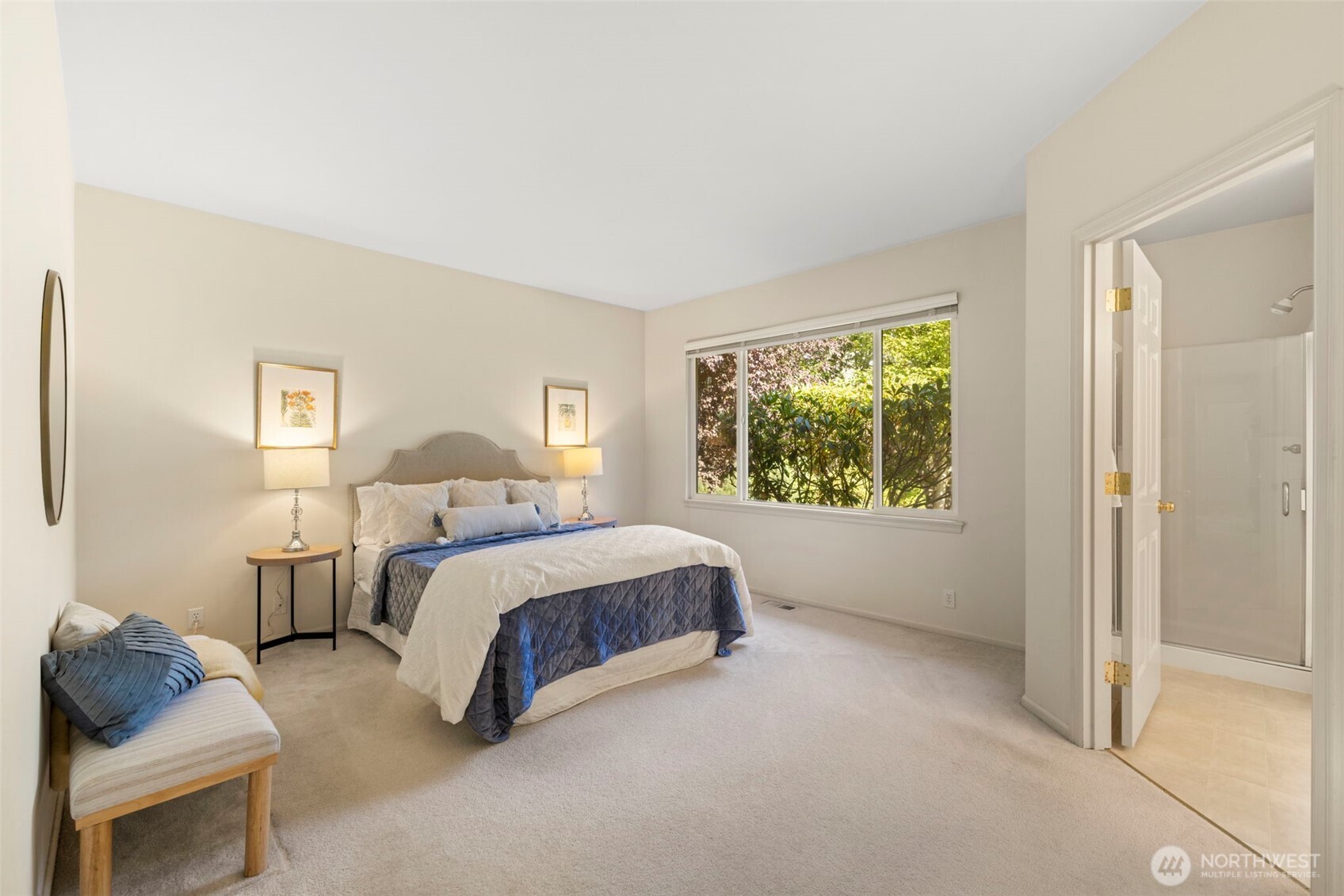 2711 204th Street Southeast Bothell, WA 98012 - Photo 16 of 22 a spacious bedroom with a bed and window
