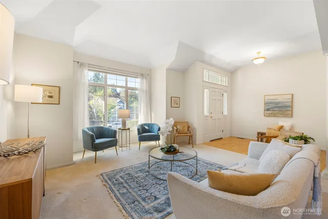 a living room with furniture and a couch