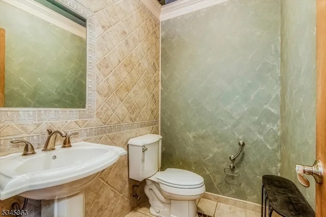 a view of a porch with furniture and a backyard