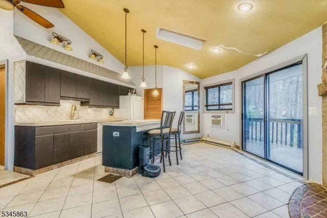 a kitchen with a sink cabinets and counter space