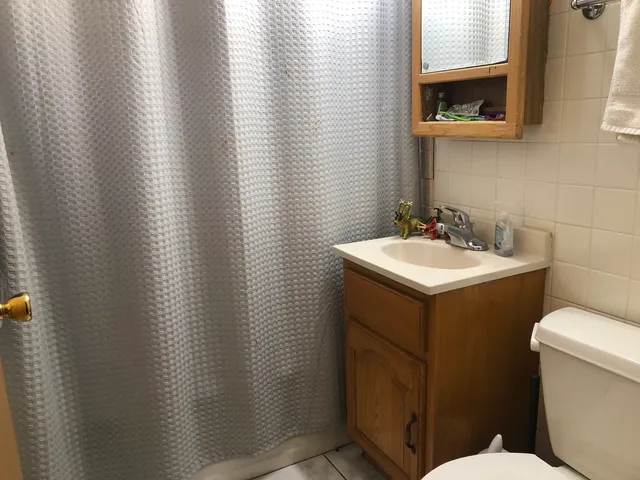a bathroom with a sink and a toilet